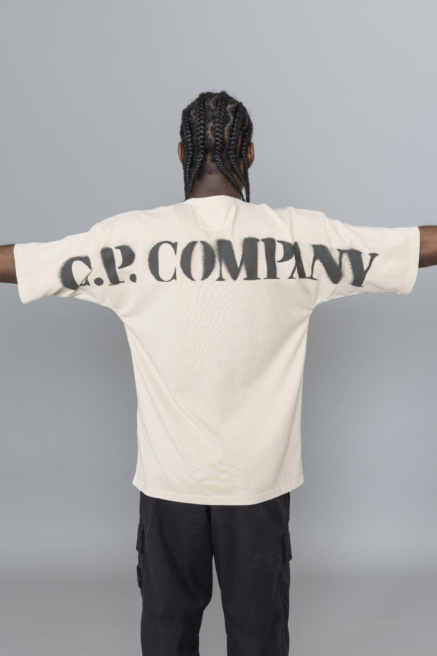 Футболка CP Company біла з написом внизу та на спині