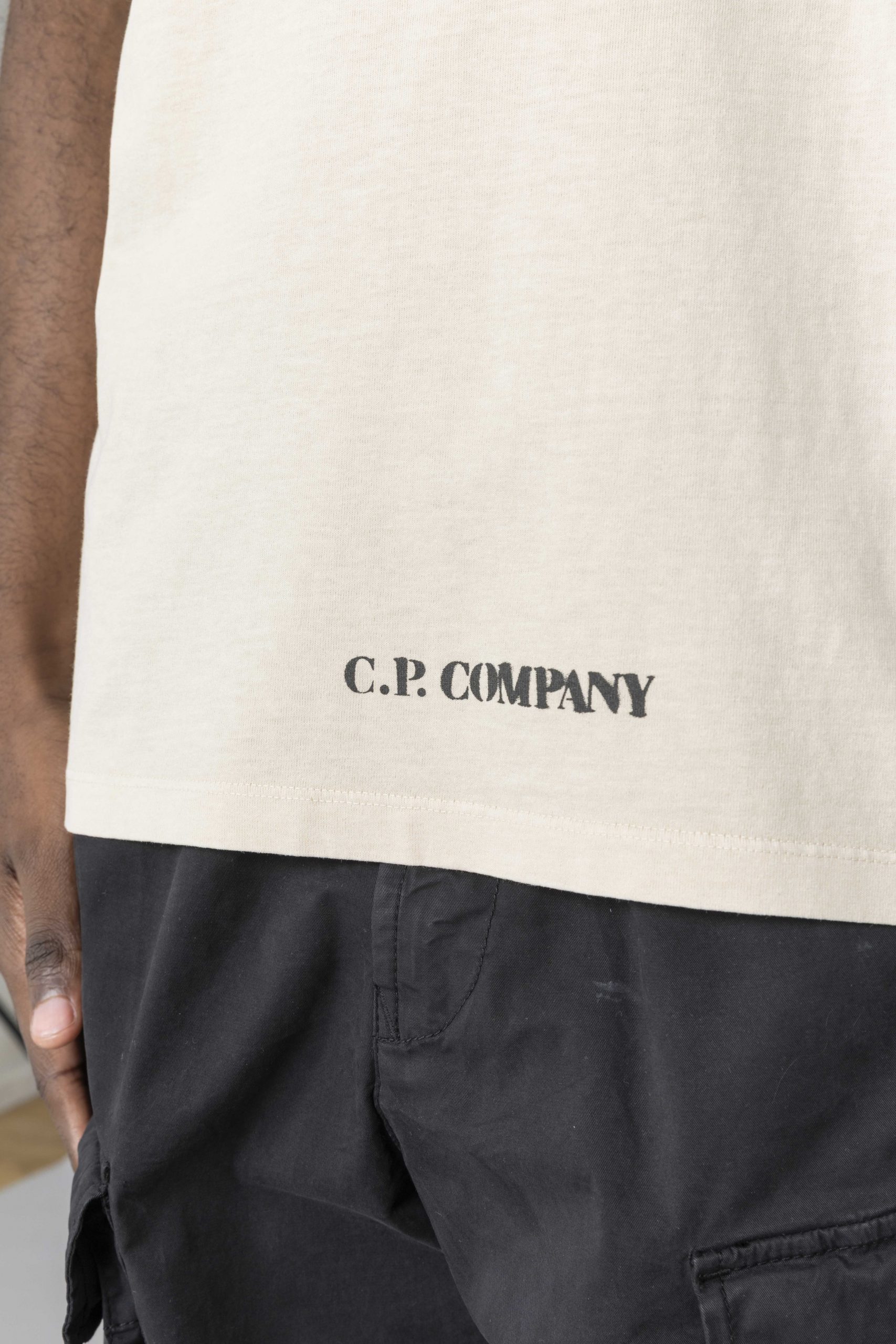 Футболка CP Company біла з написом внизу та на спині